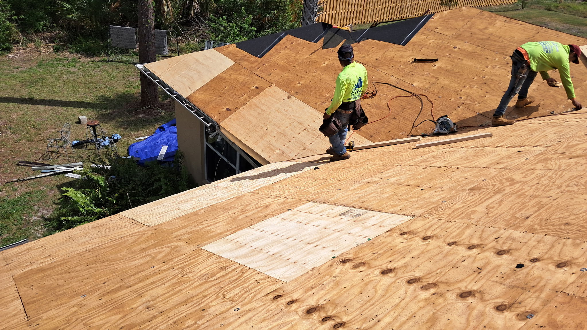 SRQ Building Services inspecting a roof after a Sarasota storm event