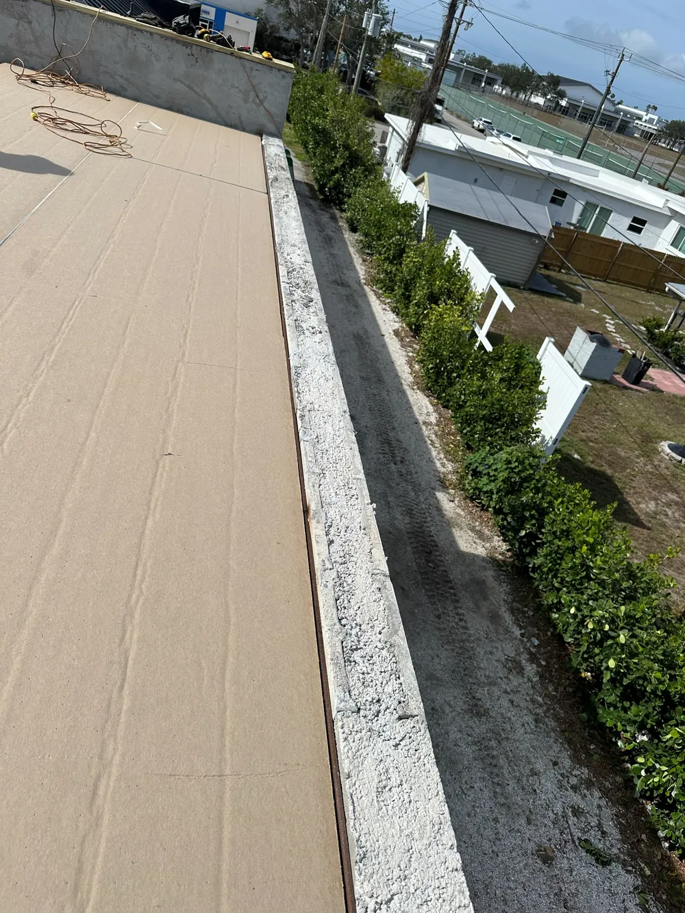 SRQ Building Services commercial roofing project on a Sarasota, FL property