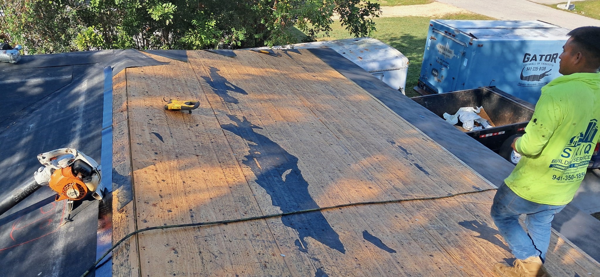 SRQ Building Services emergency tarping response on a Sarasota, FL home
