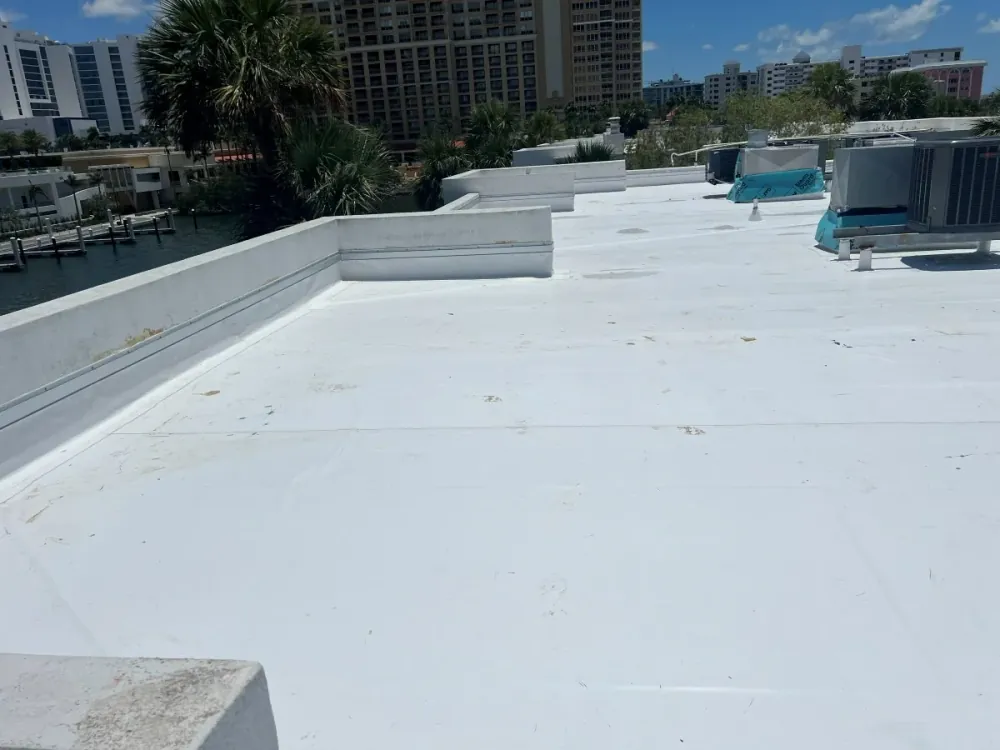 White flat roof membrane on a commercial building near the Sarasota waterfront