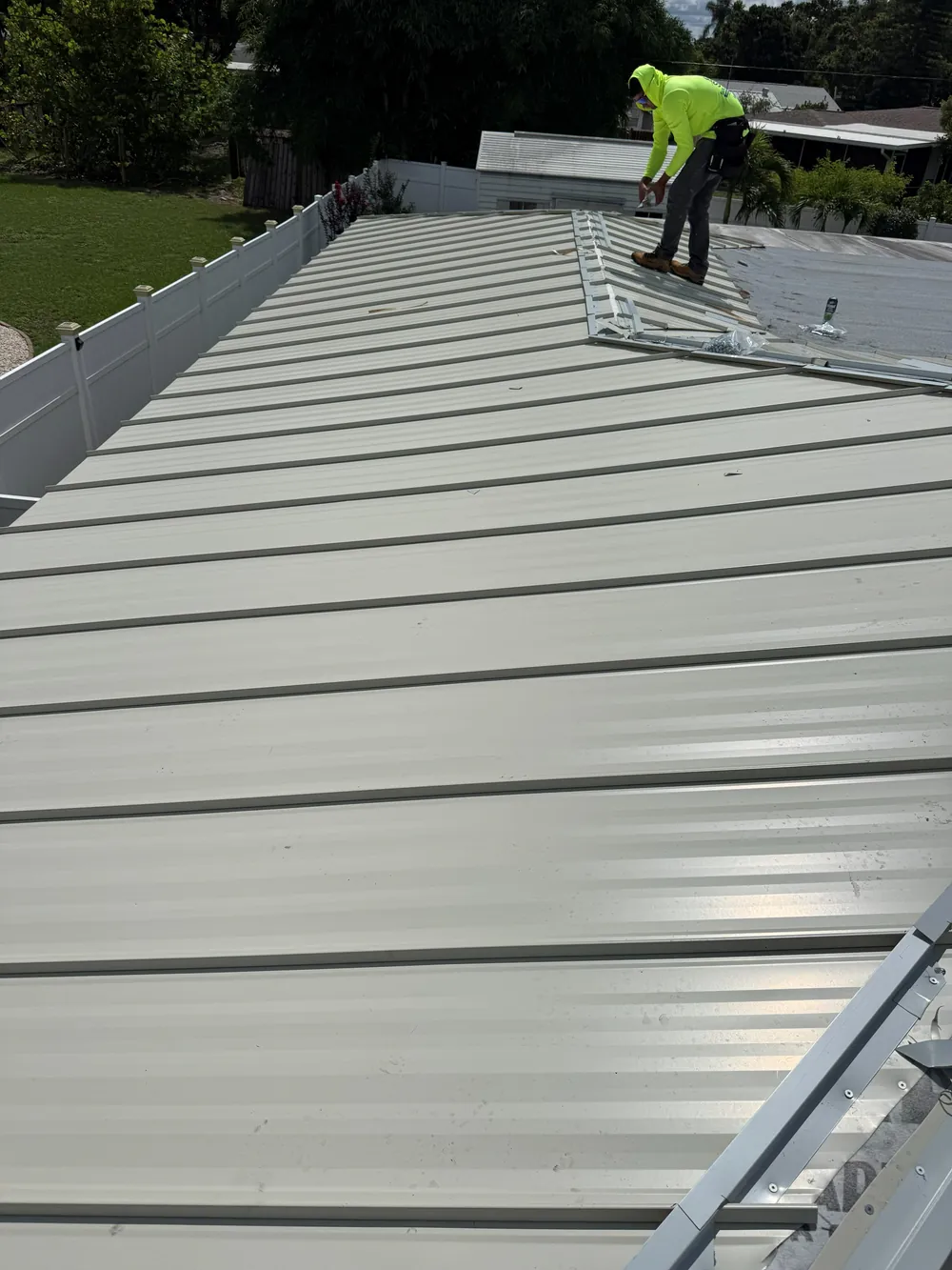 Completed metal roof project in Sarasota, FL by SRQ Building Services