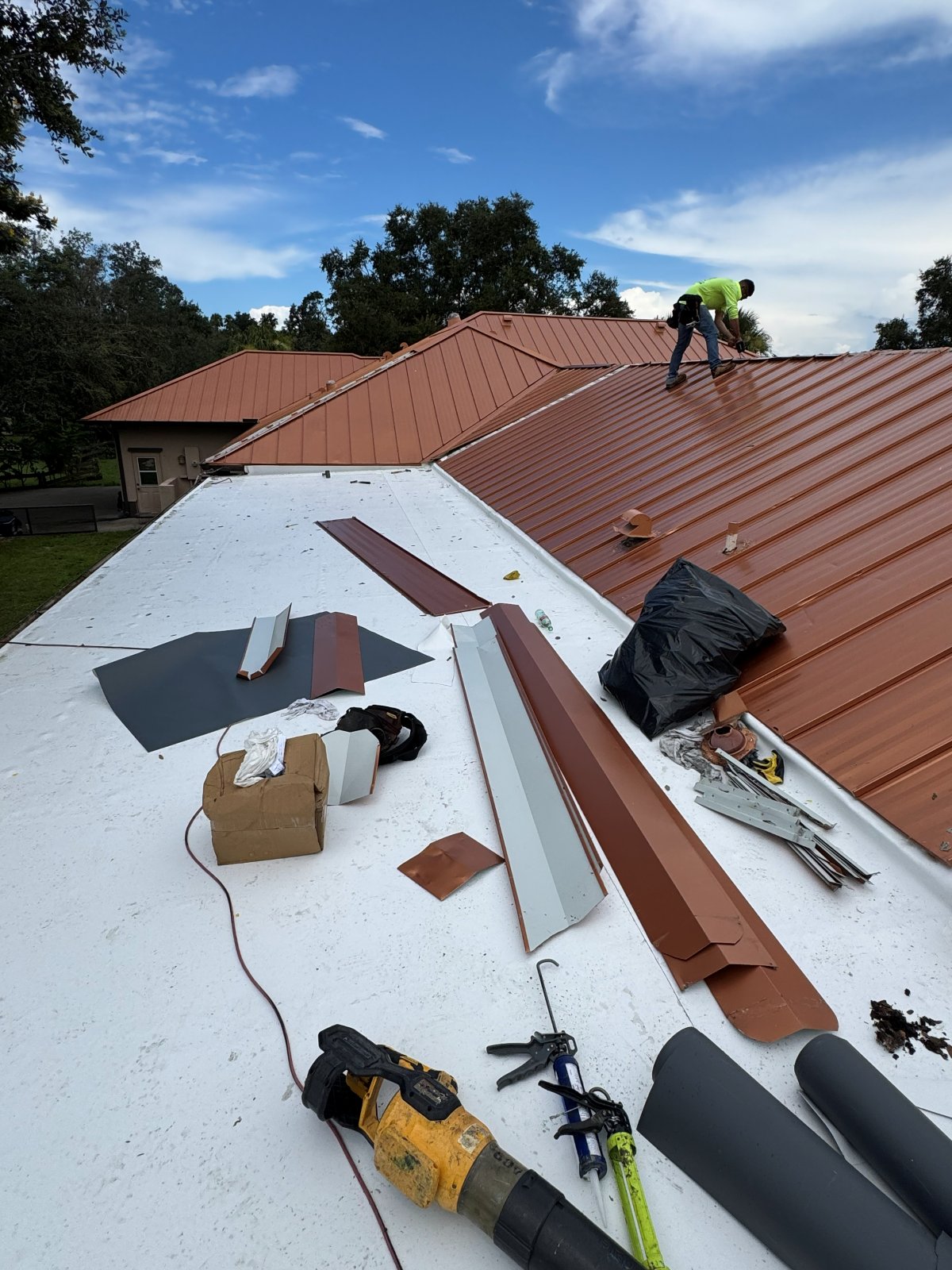 Standing seam metal roof installation in progress in Southwest Florida
