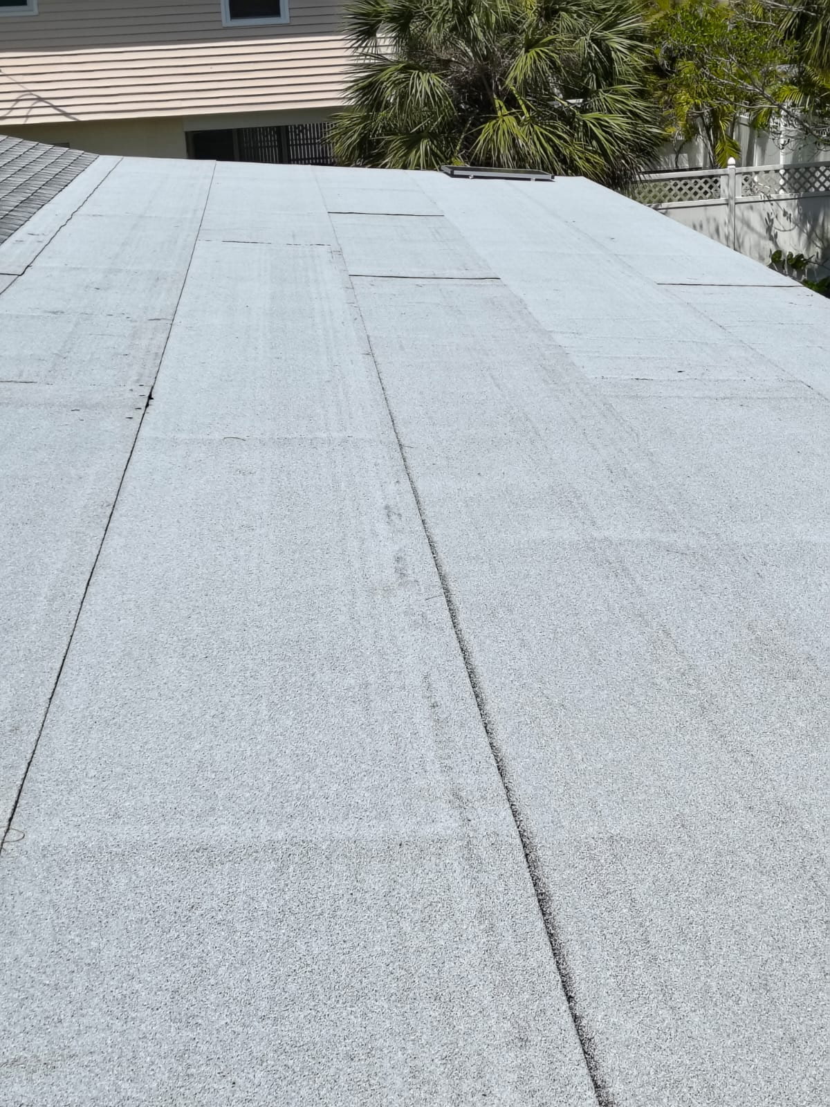Completed modified bitumen flat roof with granular cap sheet in Sarasota, FL