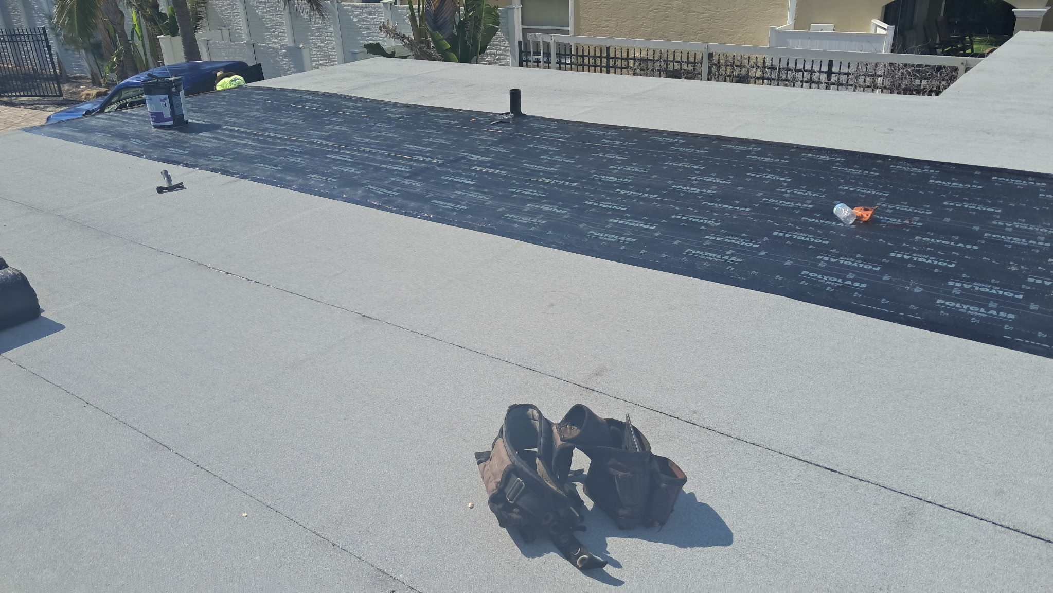 Modified bitumen membrane installation over cap sheet in Sarasota, FL